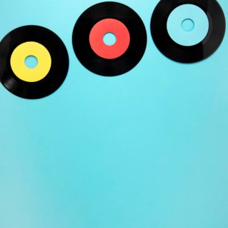 Old disc records blue background
