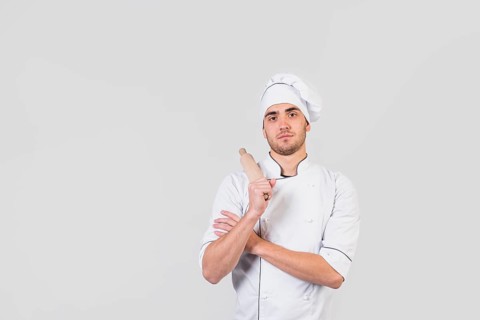 Portrait chef with rolling pin