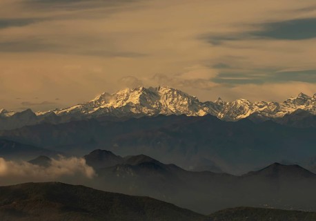 Aerial View over a Beautiful Mountainscape and And Snow Capped Monte Rosa and Mountain Peak Matterhorn and with Floating Clouds in a Sunny Day in Ticino