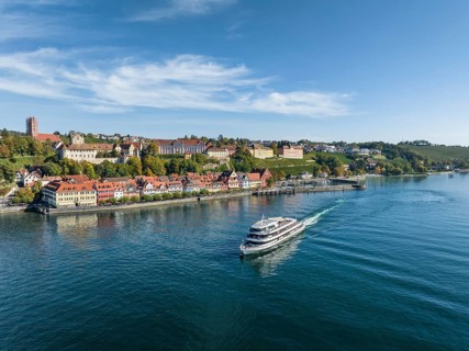 Aerial view of the town of Meersburg and the departing MS Ueberlingen of the Bodensee Schiffsbetriebe