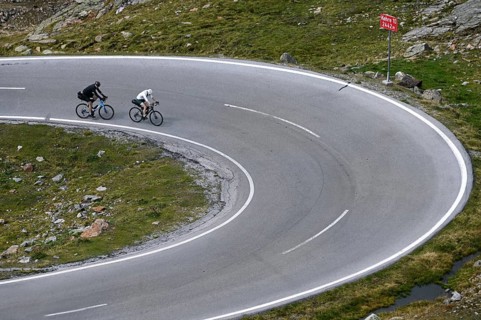 Bikepacker on the Timmelsjoch High Alpine Road between Austria and Italy