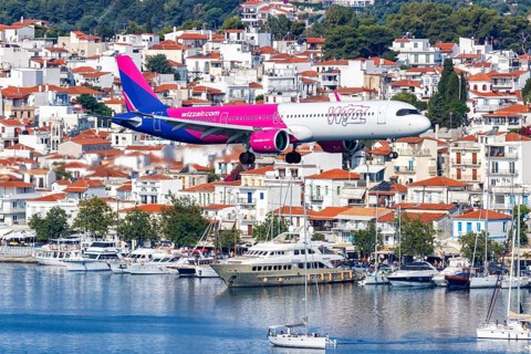 A Wizzair Airbus A321neo aircraft with the registration 9H-WAB at Skiathos Airport