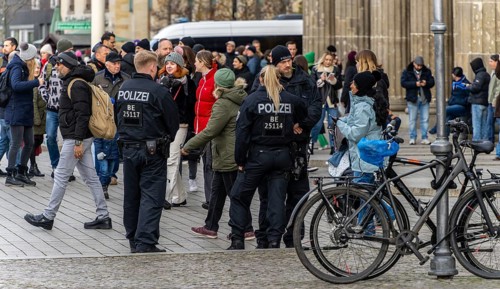 Police officers talking to cyclists