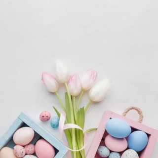 Top view cute boxes with colorful easter eggs bouquet tulips