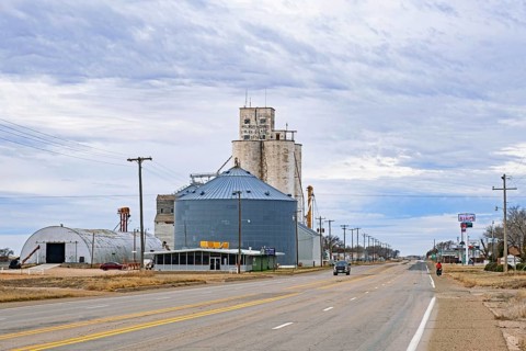 Silos connected to a grain elevator on a farm in the village Melrose in Curry County