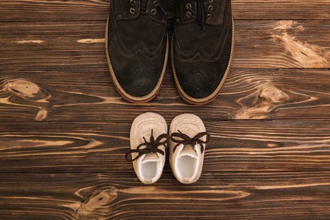 Male shoes near kid boots