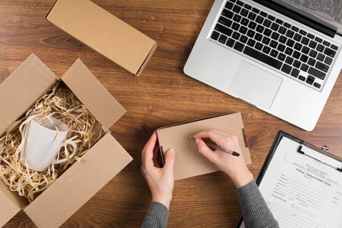 Woman preparing cyber monday box