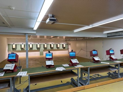 Modern Shooting Range with Target and Eletronic System in an Illuminated Underground Tunnel in Switzerland