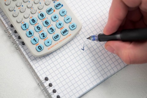 Hand writing with pen paper