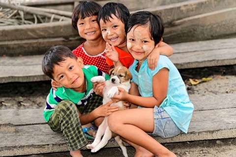 Children with thanaka paste on their faces