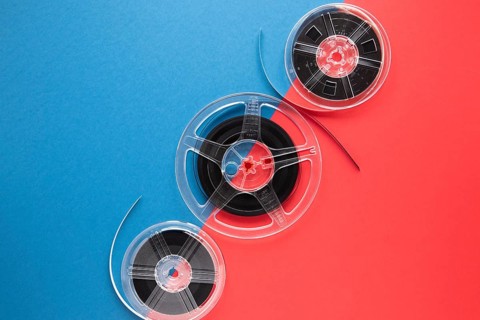Movie reels bicolored background with copy space