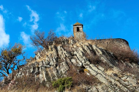 View from below of Brionnet chapel around Saurier village on volcanic peak