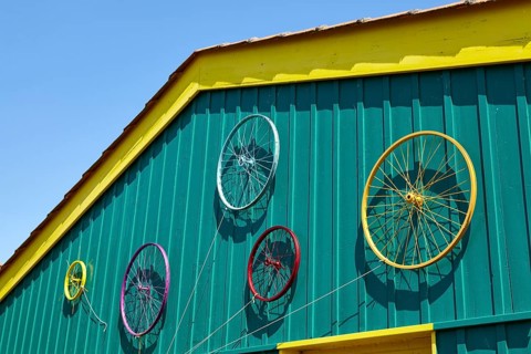 Coloured painted wheels on an art glass in Le Chateau-d'Oleron