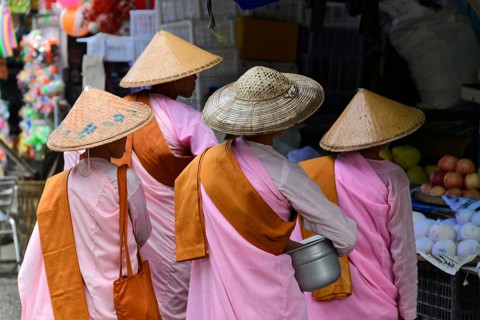 Buddhist nuns going begging