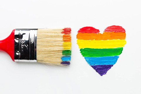 Big paint brush rainbow heart close up