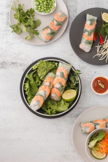 Top view fresh shrimp rolls with salad sauce