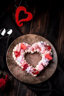 Valentines day heart shaped cake with macarons