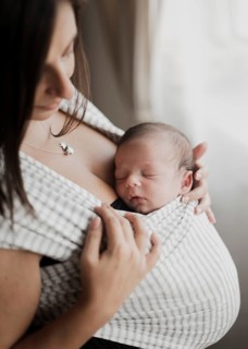 Portrait mother holding her little kid