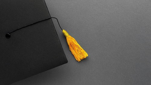 Top view academic cap with copy space