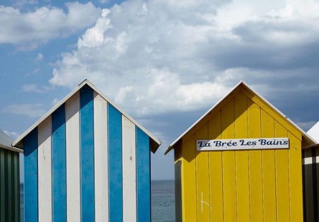 Colourful bathing houses on the beach at La Bree-les-Bains