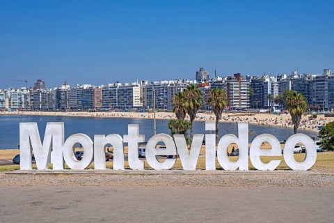 Montevideo sign on Playa de los Pocitos beach on the banks of the Rio de la Plata