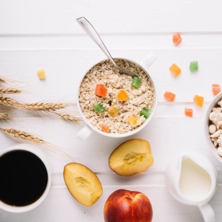Healthy breakfast with oatmeal white table