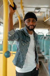 Medium shot man traveling by bus