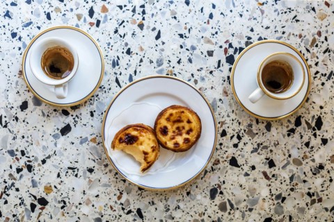 Delicious portuguese pastry named pastel de Belem or pastel de nata typically eaten with expresso coffee