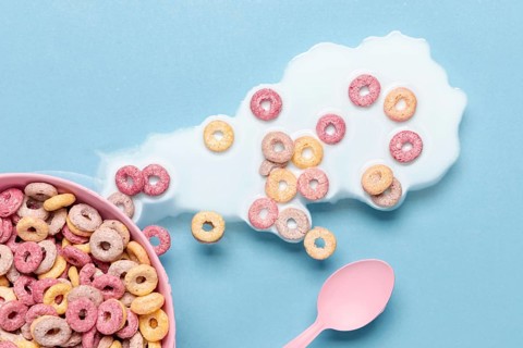 Spilled milk cereals bowl top view