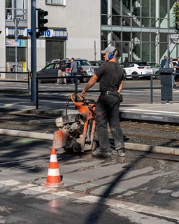 Road construction site next to a tram station