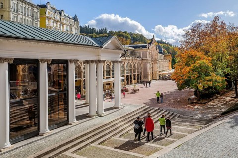 Spa promenade with spa colonnade in the autumnal spa park