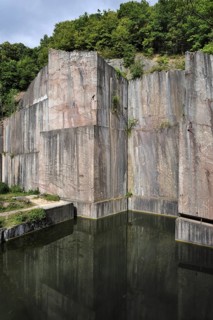 The abandoned red marble quarry Carriere de Beauchateau at Senzeilles in the Belgian Ardennes