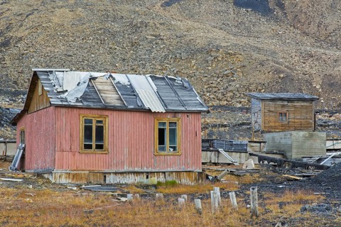 Derelict wooden buildings at Pyramiden
