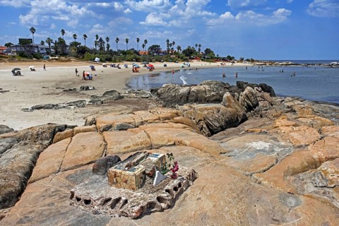 Tourists sunbathing on the Playa Verde beach