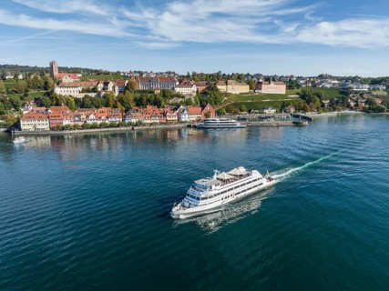 Aerial view of the town of Meersburg and the departing MS Graf Zeppelin of the Lake Constance Schiffsbetriebe