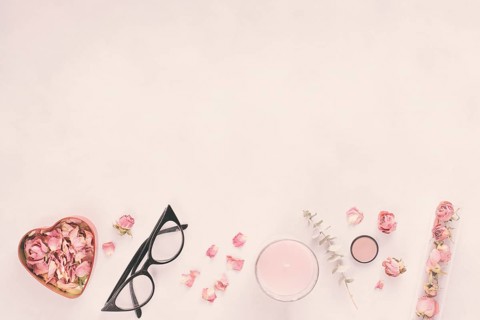 Rose petals with glasses candle table