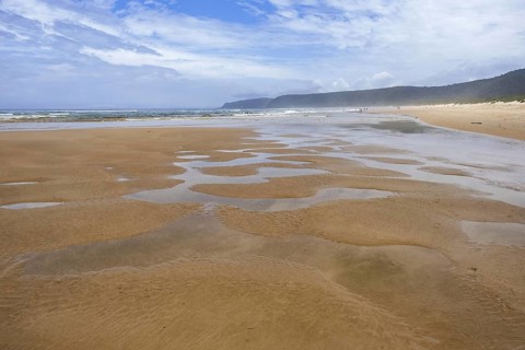 Nature's Valley sandy beach along Indian Ocean in the Tsitsikamma Section of the Garden Route National Park