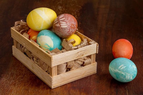 High angle colorful eggs easter wooden crate