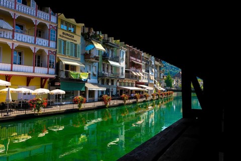 River Aare in City of Thun and View from Untere Schleuse Bridge in a Sunny Summer Day in Bernese Oberland