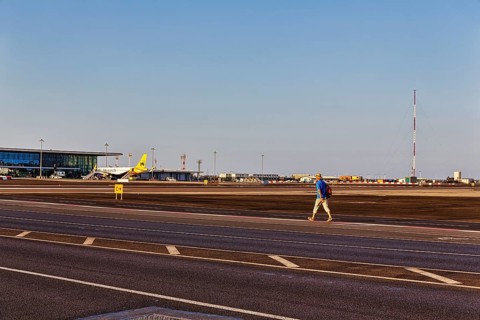 Tourist walking on Winston Churchill Avenue