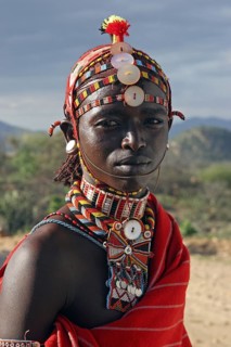 Portrait of Samburu warrior in traditional red dress