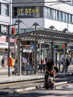 Road construction site next to a tram station