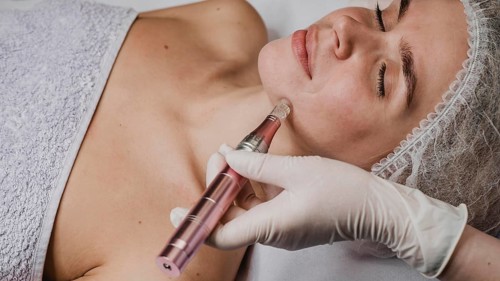 Woman wellness center having skin treatment