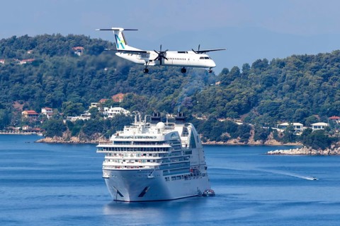 A De Havilland Dash 8 Q400 aircraft of Avanti Air with the registration D-AASH at Skiathos Airport