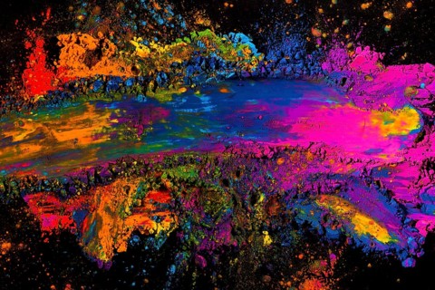Overhead view messy colorful holi color