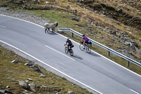 Bikepacker on the Timmelsjoch High Alpine Road between Austria and Italy