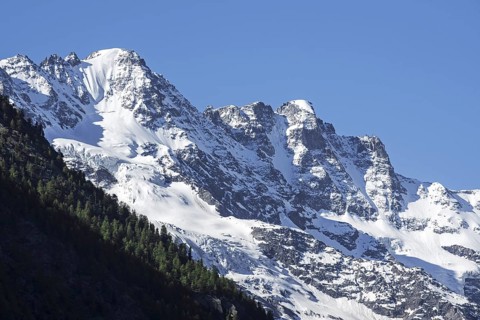 Snow covered mountain Gran Paradiso seen from Cogne in the Graian Alps