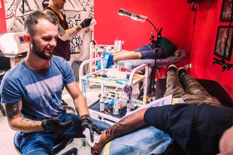 Tattoo studio with masters clients