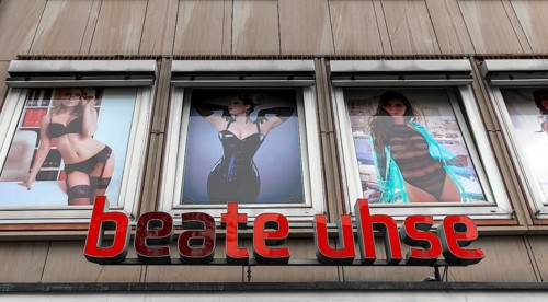Logo Beate Uhse with advertising posters