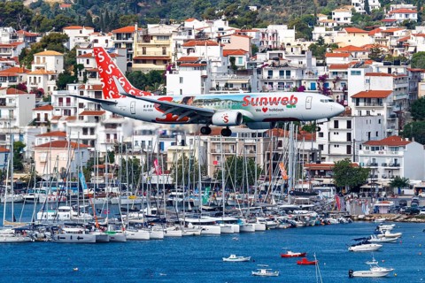 A Boeing 737-800 aircraft of Transavia with the registration PH-HXA and the Sunweb special livery at Skiathos Airport